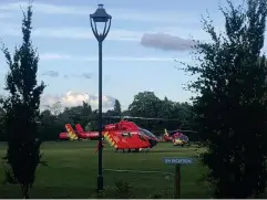  ?? (AP) ?? Air ambulances near Forbury Gardens, Reading