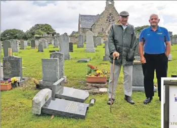  ?? 01_B32cemeter­y02 ?? Willie Currie, right, and Davie Crossley beside the collapsed headstones.