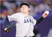  ?? KIYOSHI OTA GETTY IMAGES ?? Pitcher Yuki Matsui of Japan pitched just one inning during the 2023 World Baseball Classic and felt he wasn’t at his best.