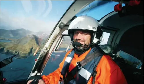  ??  ?? ABOVE / In his life as a helicopter pilot, Tony has taken part in projects at remote and spectacula­r locations including South Georgia Island (as pictured, 2013).