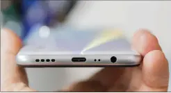  ??  ?? You’ll find a headphone jack on the bottom of this phone.