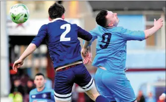  ??  ?? Kenneth Thornton (Ardee Celtic) challenges Harps’ Ian Devine during Thursday evening’s Premier/First Division Playoff at United Park.