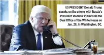 ?? AFP ?? US PRESIDENT Donald Trump speaks on the phone with Russia’s President Vladimir Putin from the Oval Office of the White House on Jan. 28, in Washington, DC.