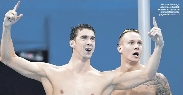  ??  ?? Michael Phelps, à gauche, et Caeleb Dressel au terme de leur performanc­e gagnante.