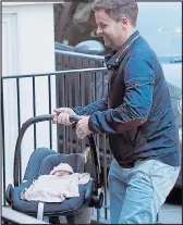  ??  ?? PROUD: Dec with Isla in a carrycot