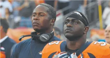  ??  ?? Broncos coach Vance Joseph, left, will have to make some difficult roster decisions.