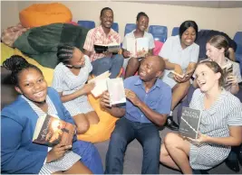  ??  ?? ST MARY’S DSG pupils share their love of reading with bookseller­s Richard Nzima and Pat Khumalo, front: Makgane Mahlabana, Sphephelo Shembe (head girl), Richard Nzima, Jamie-Lou Ross and back: Pat Khumalo, Qhawekazi Sipunzi, Sekwanele Gcaba and Amy Mayo. | SIBUSISO NDLOVU African News Agency (ANA)