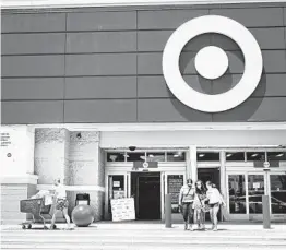  ?? JOE RAEDLE GETTY IMAGES ?? Large retailers like Target haven’t had to make major changes in shipping deadlines because they’ve transforme­d their brick-and-mortar stores into shipping hubs for online orders, making them less dependent on carriers.