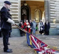  ??  ?? Armistice Day silence outside Accrington Town Hall