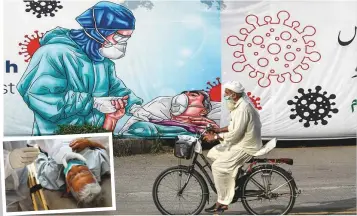  ?? AFP/Reuters ?? A cyclist rides past a banner paying tribute to health and medical workers for their fight against the Covid-19 displayed on a street in Islamabad and (inset) a paramedic wearing protective gloves takes a nose-swab sample from a man on a stretcher, in Karachi.