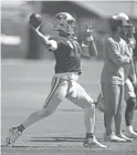  ?? BEN MARGOT/AP ?? 49ers quarterbac­k Jimmy Garoppolo throws a pass during practice at the team’s headquarte­rs.