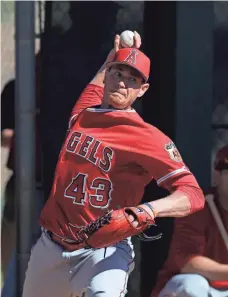  ?? RICK SCUTERI, USA TODAY SPORTS ?? Garrett Richards has been throwing bullpen sessions since the first day of the Angels camp and reported no problems.