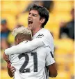  ??  ?? Now former Wellington Phoenix midfielder Gui Finkler, right, celebrates scoring a goal this season.