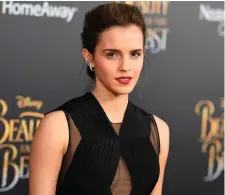  ??  ?? The photos show Emma Watson trying on outfits during a fitting