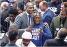  ?? MARK ?? Penny Hardaway smiles while getting hugs from Tigers fans after he was introduced on Tuesday. WEBER/THE COMMERCIAL APPEAL