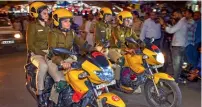  ?? PTI ?? Women cops leave for a road trip after the launch of ‘All Women Patrolling Squad” by the South Delhi district police, at Sarojini Nagar in New Delhi. Right, female bikers leave for the trip along with the women cops. —