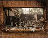  ?? (The New York Times/Alisha Jucevic) ?? Barkley’s Tavern, built in 1898 and long the town’s lone bar, in Phoenix, Ore., was destroyed after the Almeda Fire burned through the area last week.