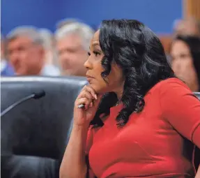  ?? ?? Fulton County District Attorney Fani Willis argued in a filing Monday that Judge Scott McAfee correctly found she had no conflict of interest in the case.