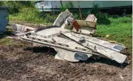  ??  ?? LEFTAll that’s left of a decaying boat. Photo: Jeff Erdman