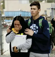  ?? MARCIO JOSE SANCHEZ — THE ASSOCIATED PRESS ?? Students react to a shooting as they are escorted out of Saugus High School on Thursday in Santa Clarita.