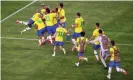  ??  ?? Brazil celebrate after Reinier’s decisive penalty in the shootout with Mexico. Photograph: Mike Segar/Reuters