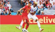  ?? AFP ?? Belgium’s Eden Hazard (left) vies with Panama’s Michael Murillo during their Group G match in Sochi on Monday.