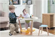  ??  ?? The Bobbin Triple Play Centre grows with your child. For infants it’s a baby seat and play centre, for toddlers it becomes an activity table, and for older children it flips over to become a work table. $549, threepears.ca