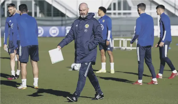  ?? ?? 0 Scotland head coach Steve Clarke takes charge of a training session at Oriam in Edinburgh yesterday ahead of the vital game against Israel at Hampden on Saturday