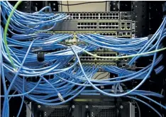 ?? THE CANADIAN PRESS FILES ?? Networking cables and circuit boards are shown in Toronto. Government and industry insiders expect next week’s federal budget will boost investment­s to help strengthen cybersecur­ity.