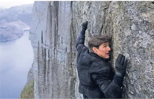  ?? FOTO: DPA ?? Klettern ist nur eine Agenten-Disziplin: Tom Cruise als Ethan Hunt in einer Szene des Films „Mission: Impossible – Fallout“