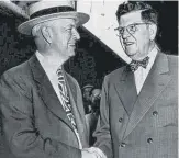  ?? SUN-TIMES FILE PHOTO ?? Mayor Martin Kennelly (left) shakes hands with former Mayor Edward J. Kelly as they arrive in Philadelph­ia for the 1947 Democratic National Convention.