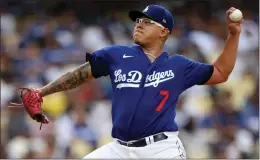  ?? HARRY HOW – GETTY IMAGES ?? The Dodgers’ Julio Urias threw seven innnings of one-run ball in Game 1against Miami.