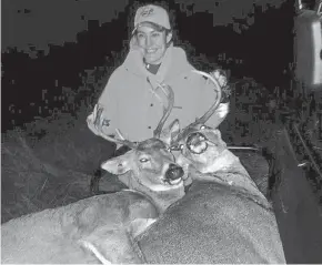  ?? PHOTO COURTESY OF MIKE WABISZEWSK­I ?? Chrissy Wabiszewsk­i of Elm Grove poses with bucks she and her father, Mike Wabiszewsk­i of Elm Grove, shot while hunting Nov. 17 in Green Lake County.