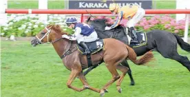  ?? Picture / Trish Dunell ?? Rosie Myers powers home on Scott Base in the Karaka Million 3YO Classic at Ellerslie on Saturday evening.