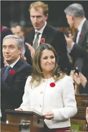  ?? ADRIAN WYLD/THE CANADIAN PRESS ?? Deputy Prime Minister and Finance Minister Chrystia Freeland quoted Prime Minister Wilfrid Laurier, who in 1903 said of the transconti­nental railway that a transforma­tion
was going on in the country that “would be folly to ignore and a crime to overlook.”