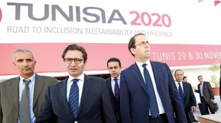  ??  ?? Tunisian Prime Minister Youssef Chahed and Investment and Internatio­nal Cooperatio­n Minister Fadhel Abdelkefi inspect the final preparatio­ns for the “Tunisia 2020” conference. (AFP)
