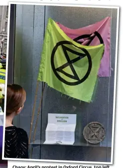  ??  ?? Chaos: April’s protest in Oxford Circus, top left, and flags and leaflets featured in the exhibition