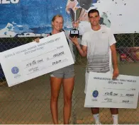  ?? (Alex Goldenstei­n) ?? LINA GLUSHKO (left) and Ben Patael pose with the trophy after winning the Anna and Michael Kahan Family Prize tournament yesterday at Ramat Hasharon.
