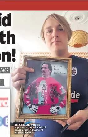  ??  ?? Bill Kirby, 35, with his supposedly signed photo of David Seaman that went viral last week