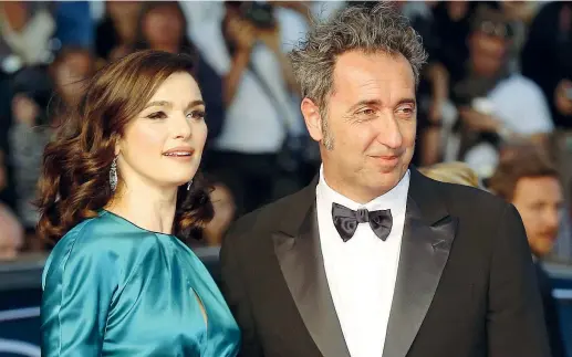  ??  ?? Con Rachel Il regista Paolo Sorrentino (44 anni) con l’attrice Rachel Weisz (45) sulla passerella del Festival di Cannes per la proiezione di «Youth - La giovinezza»