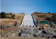  ?? AP FILE PHOTO BY RICH PEDRONCELL­I ?? In this 2017, file photo, work continues on the Oroville Dam spillway in Oroville, Calif.