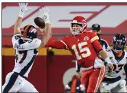  ?? (AP/Jeff Roberson) ?? Patrick Mahomes (right) and the Kansas City Chiefs are set for a matchup today against a Miami Dolphins team that has allowed the second-fewest points in the NFL.