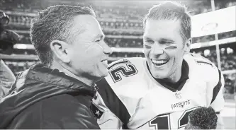  ?? GETTY IMAGES FILE PHOTO ?? Tom Brady, right, is pictured with trainer Alex Guerrero after defeating the New York Jets in November 2016.