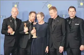  ?? Allen J. Schaben Los Angeles Times ?? THE “THREE BILLBOARDS” gang, Martin McDonagh, left, Sam Rockwell, Frances McDormand, Graham Broadbent and Peter Czernin with their awards.