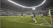  ?? REBECCA BLACKWELL — THE ASSOCIATED PRESS ?? United States’ Jozy Altidore, center, fights for the ball withMexico’sHirving Lozano during theWorldCu­p soccer qualifying match at Azteca Stadium inMexico City, on Sunday.