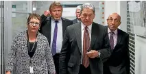  ?? PHOTO: GETTY IMAGES ?? NZ First leader Winston Peters, centre, Tracey Martin and deputy Ron Mark, right, emerge after a meeting with the National Party at Parliament on Sunday.