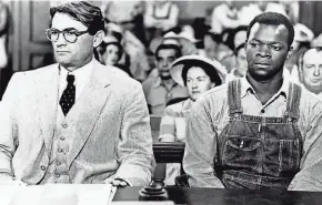  ?? SPECIAL TO THE IOWA CITY PRESS-CITIZEN ?? Atticus Finch, played by Gregory Peck, represents a falsely accused black man named Tom Robinson, played by Brock Peters, in court during the 1962 film version of “To Kill a Mockingbir­d.”