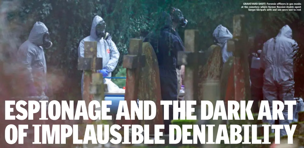  ??  ?? GRAVEYARD SHIFT: Forensic officers in gas masks at the cemetery where former Russian double agent Sergei Skripal’s wife and son were laid to rest