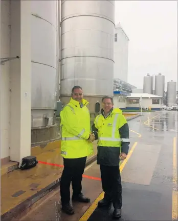  ??  ?? Pahiatua site operations manager Glenn Broughton with Fonterra COO global operations Robert Spurway with a milk powder drier in the background.