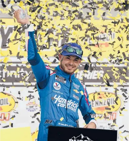  ?? JOHN LOCHER/AP ?? Kyle Larson celebrates after winning his seventh career NASCAR Cup race Sunday at Las Vegas Motor Speedway.